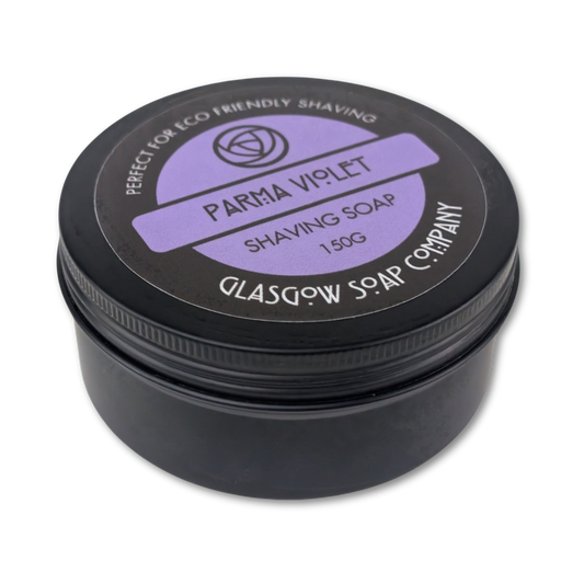 Black jar of Parma Violet shaving soap from Glasgow Soap Company on a white background