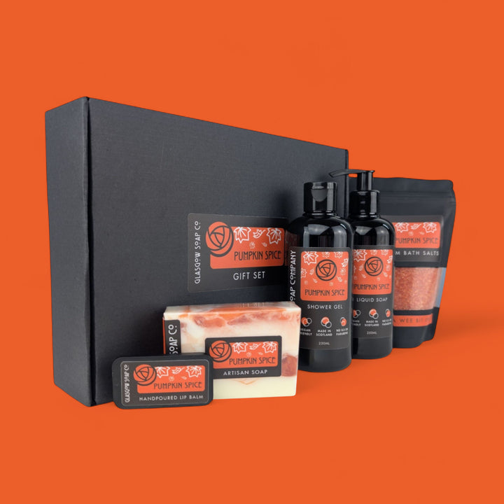 pumpkin spice bath and body gift set includins handmade soap. lip balm, shower gel, liquid soap and epsom bath salts
