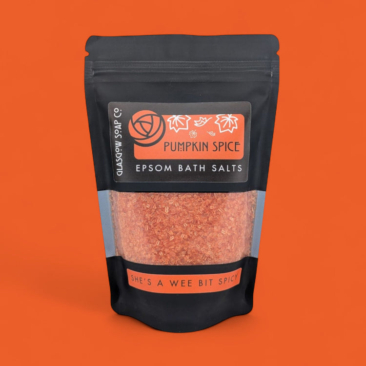 Pack of Glasgow Soap Co. Pumpkin Spice Epsom Bath Salts on an orange background