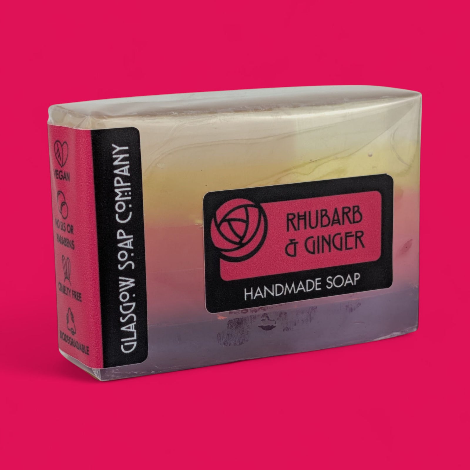 Handmade soap bar from Rhubarb & Ginger Glasgow Soap Company on a pink background
