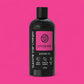 Black bottle of Glasgow Soap Company Scottish Rose Shower Gel on a pink background