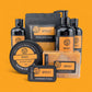 Collection of Whisky Soap Company products on an orange background