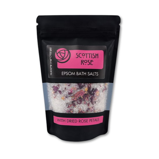 Scottish Rose Epsom Bath Salts packaging with dried rose petals on a white background