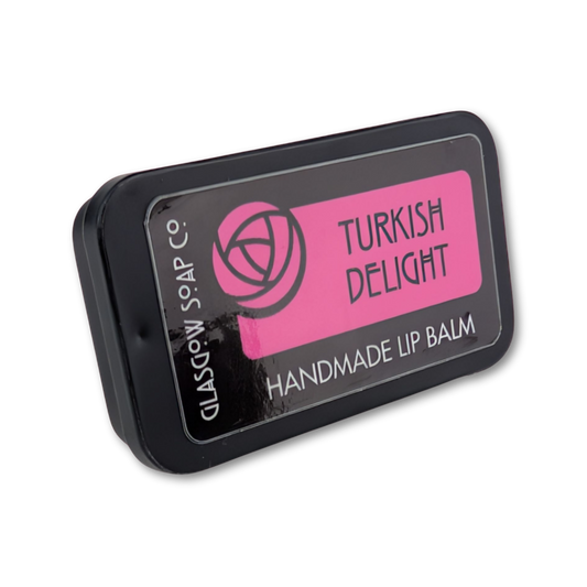 Handmade lip balm packaging with 'Turkish Delight' flavor on a white background