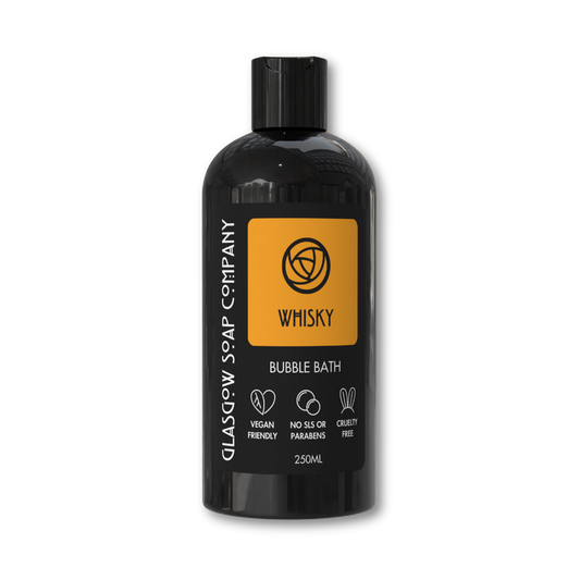 Black bottle of Glasgow Soap Company whisky bubble bath on a white background