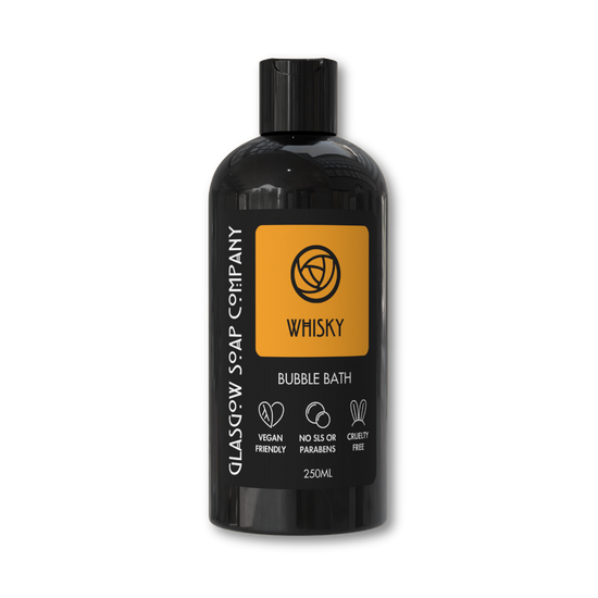 Black bottle of Glasgow Soap Company whisky bubble bath on a white background