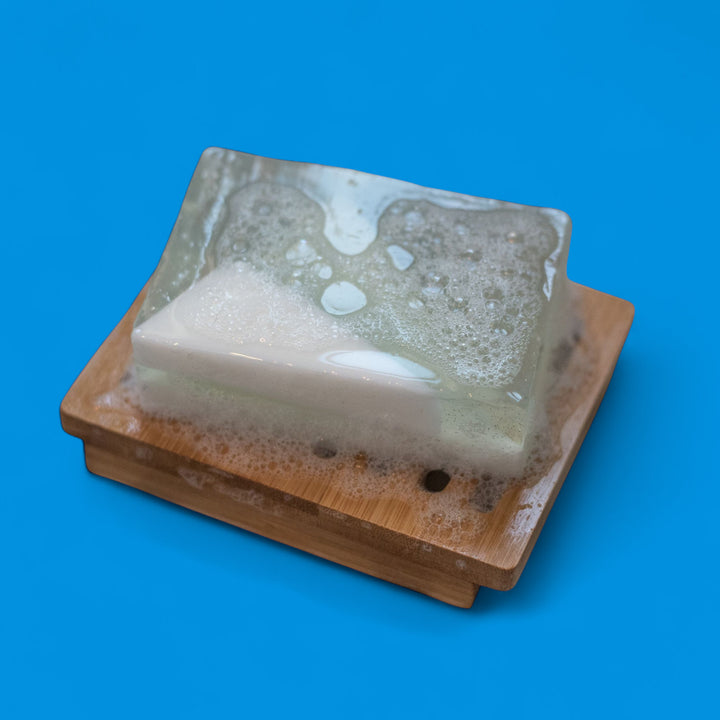 Rectangular soap bar with brown base on a blue background
